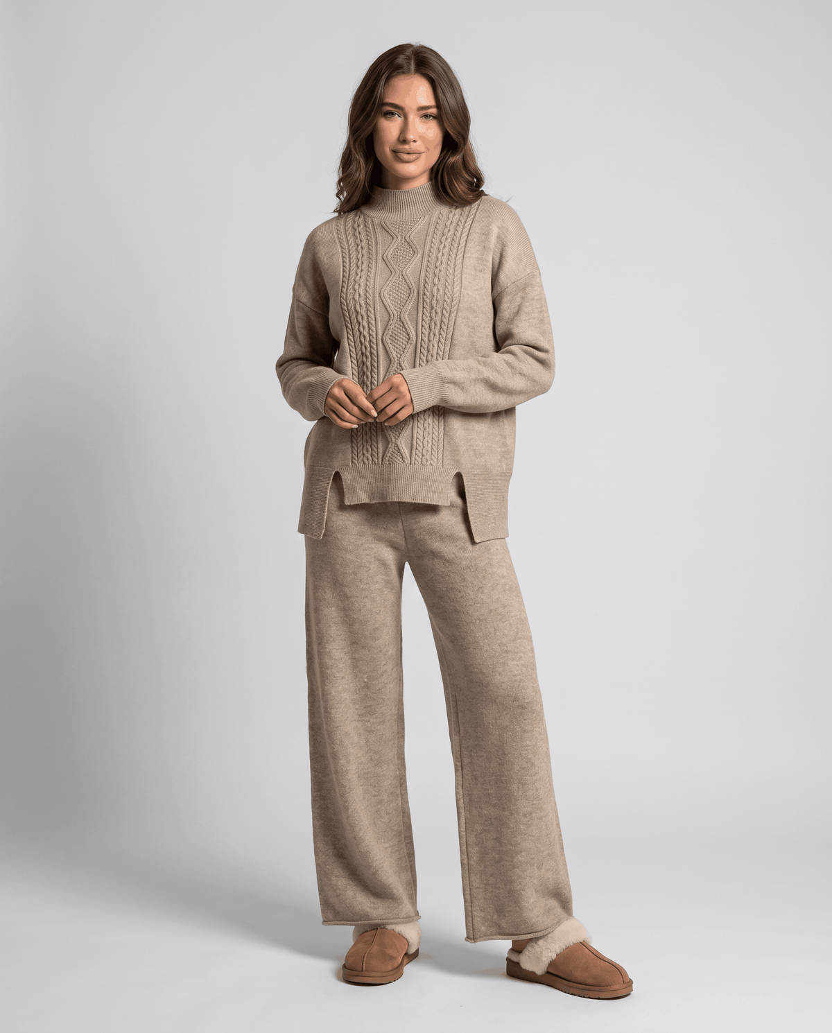 Woman wearing a khaki cable knit lounge set with mock neck pullover and wide-leg pants