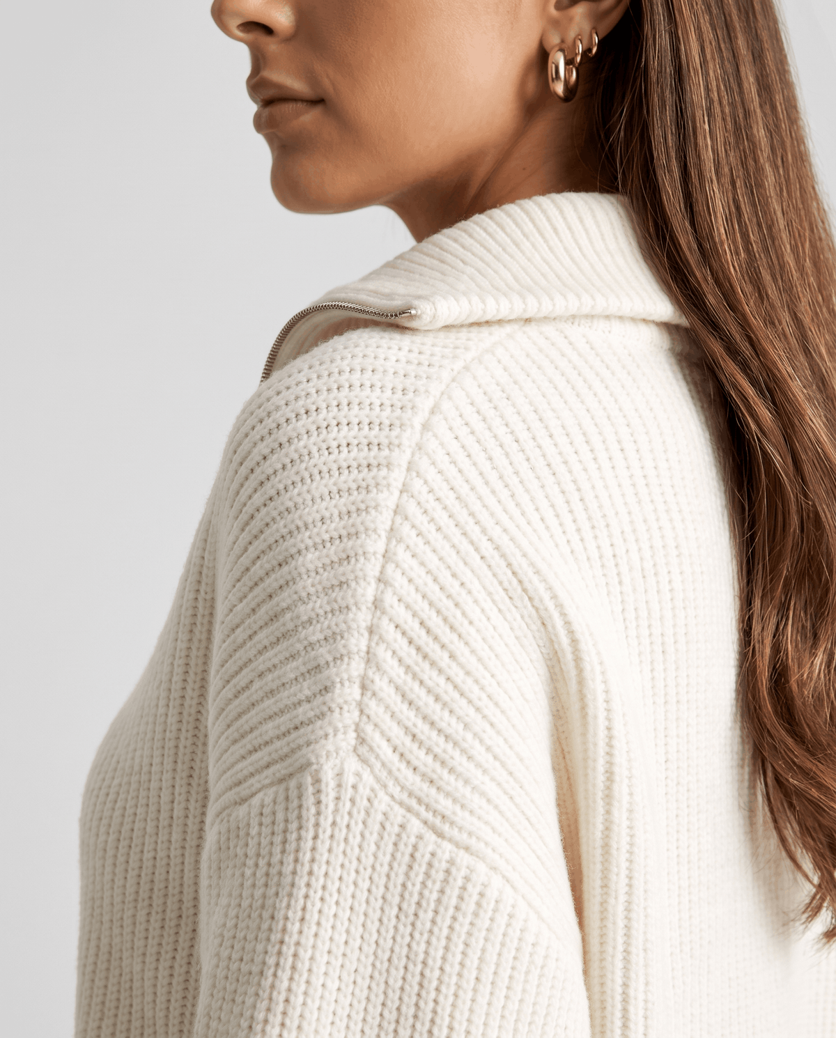 Rear shoulder detail showing the drop shoulder seam and chunky ribbing