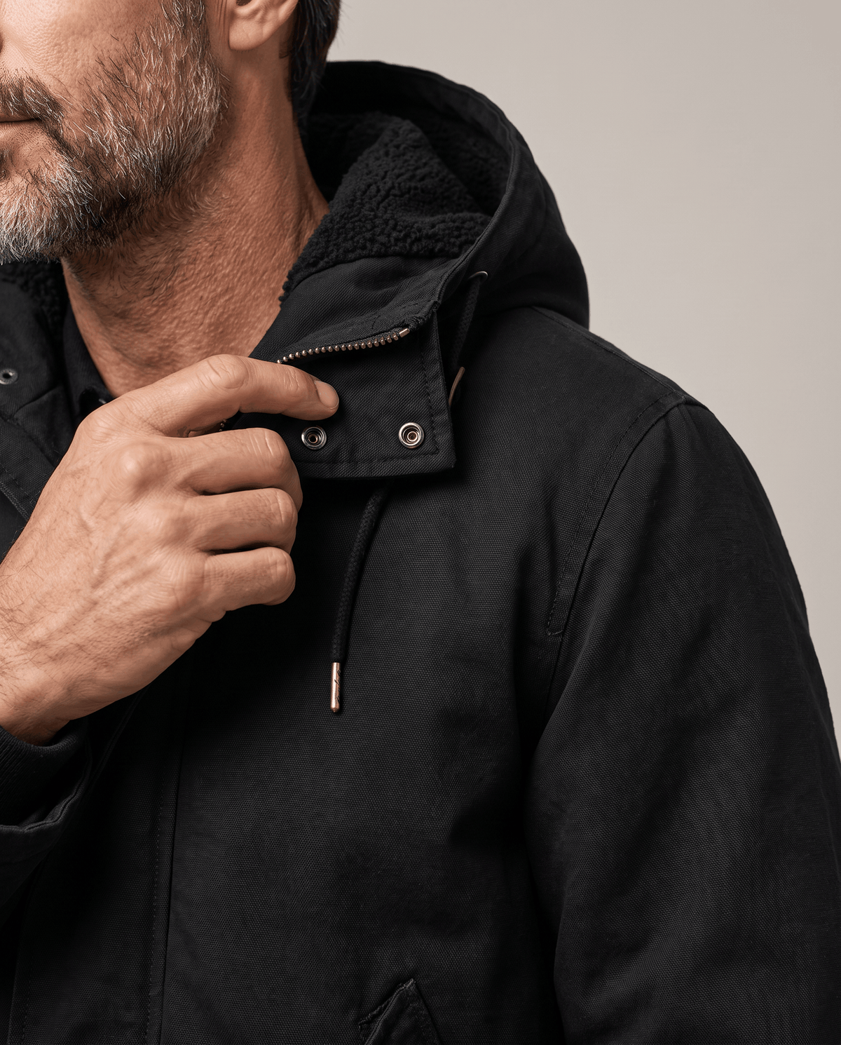 Men's black cotton hooded parka, collar close-up