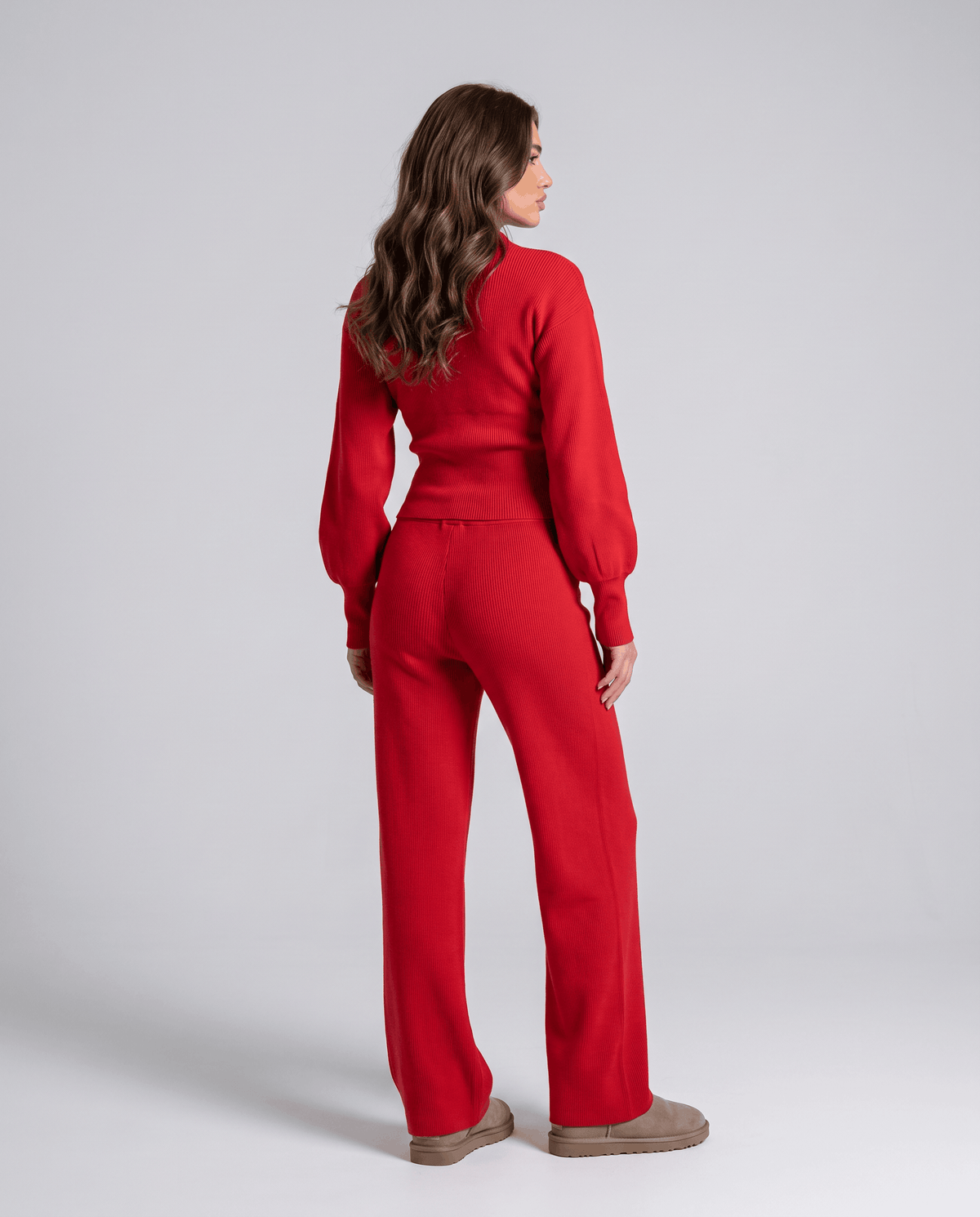 Red knit loungewear set, back view of the puff-sleeve top and straight-leg pants