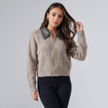Women's cropped zip-up cardigan in taupe with a dark collar and black leggings
