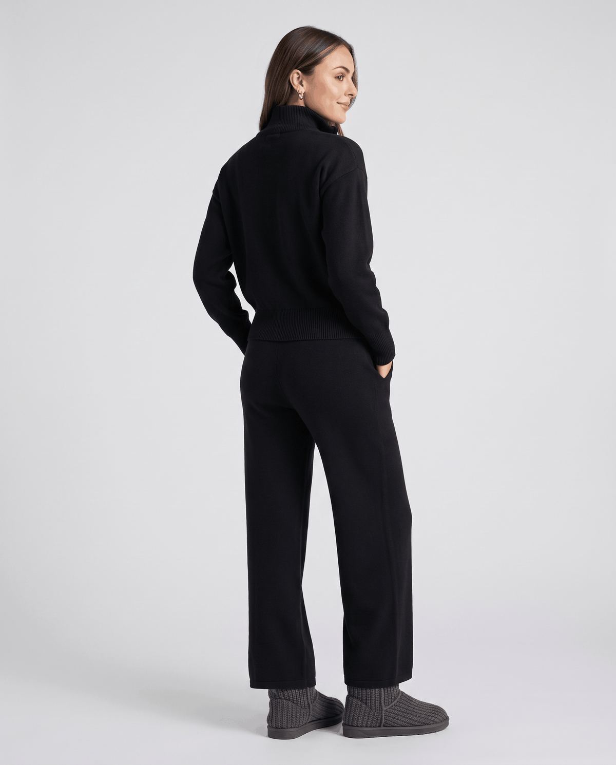Black knit loungewear set, back view of the stand-collar jacket