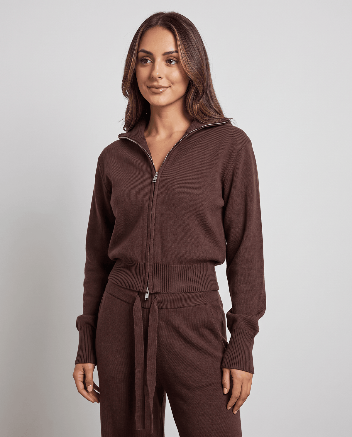 Dark brown knit loungewear set, front view of the zip-up stand-collar jacket and drawstring waist