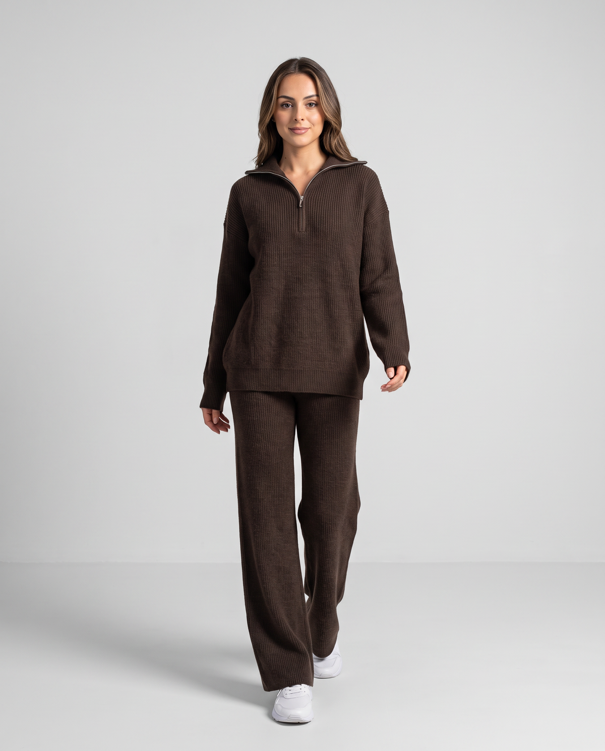 Dark brown ribbed knit pullover and wide-leg pants, full-length front view