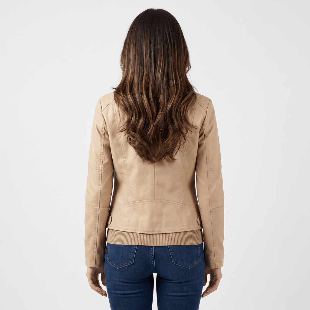 Back view of a women's camel faux leather jacket with a clean minimalist design and fitted silhouette.