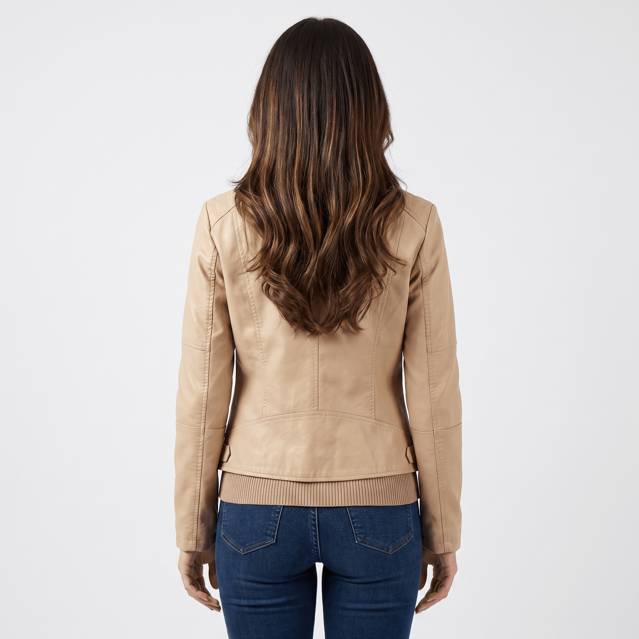 Back view of a women's camel faux leather jacket with a clean minimalist design and fitted silhouette.