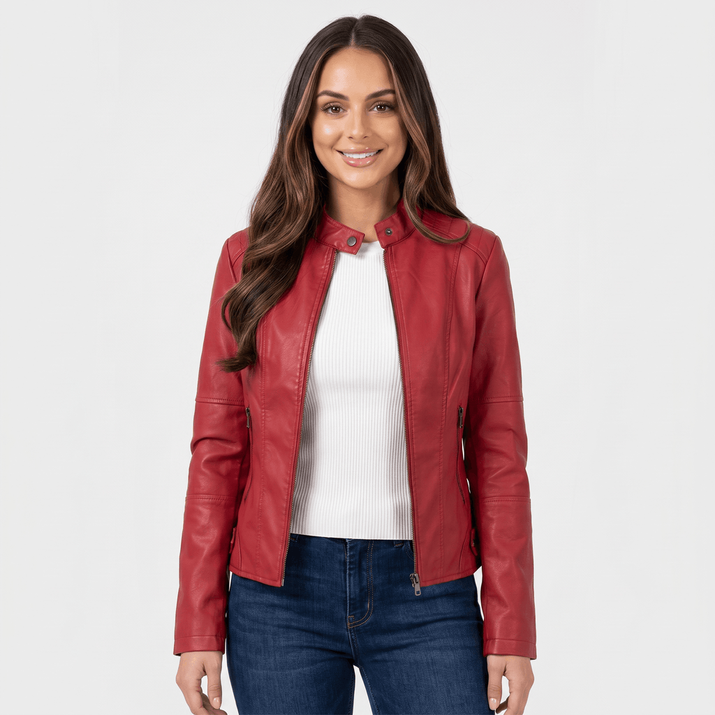 Woman wearing a red faux leather jacket with a zip-front closure, fitted silhouette, and long sleeves over a white top.