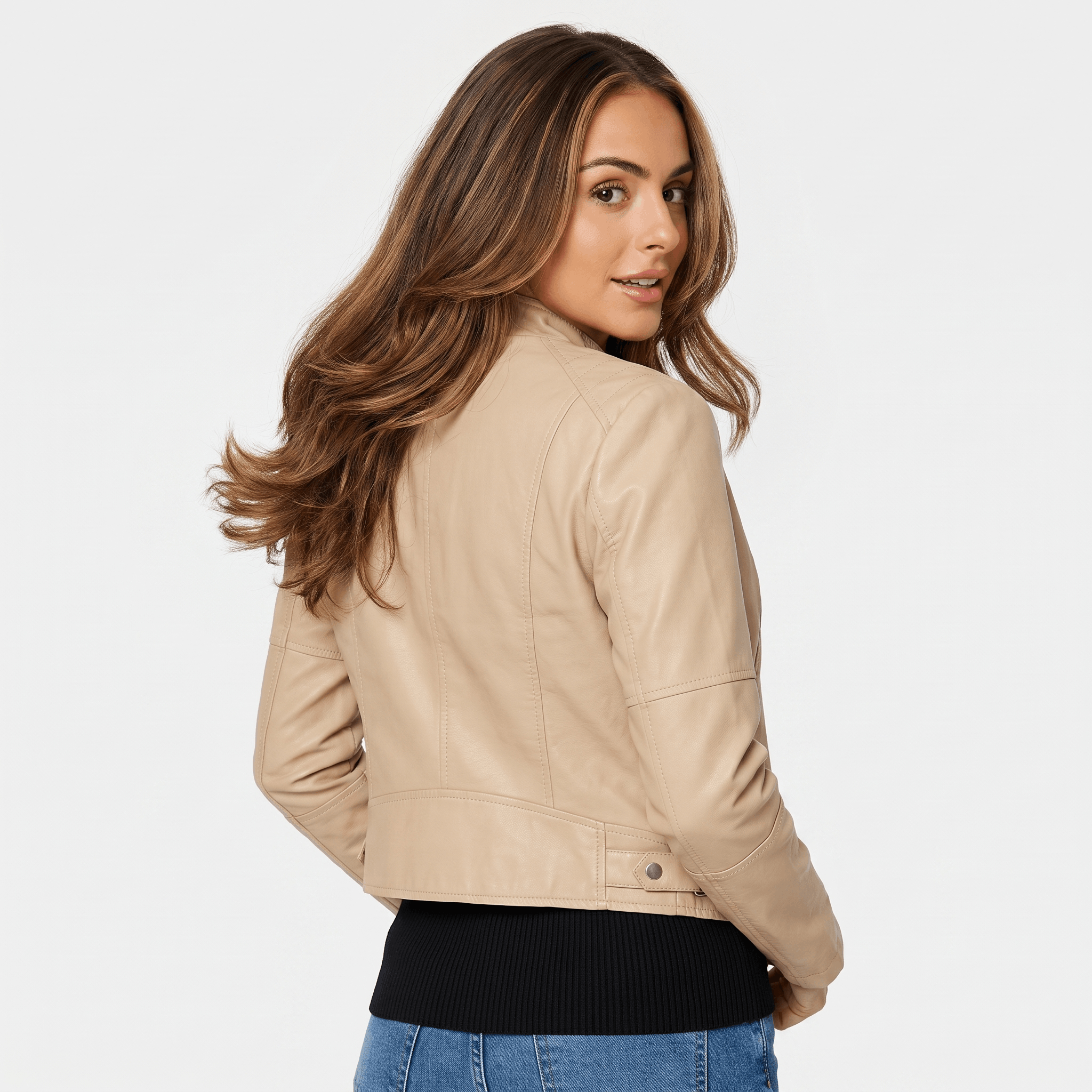Back view of a women's camel faux leather jacket with a clean minimalist design and fitted silhouette.
