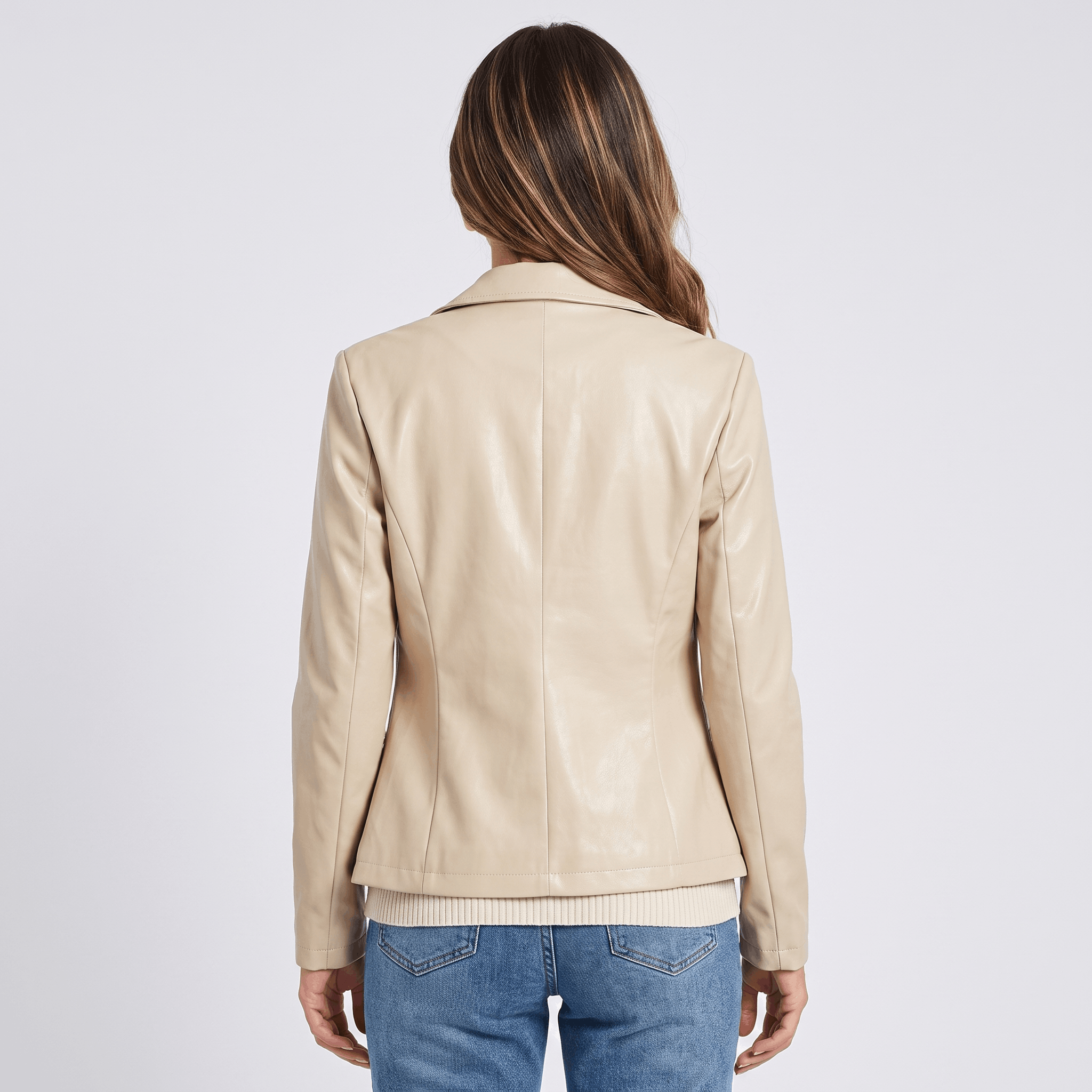 Back view of a women's beige faux leather blazer featuring a structured silhouette, long sleeves, and clean tailored design.