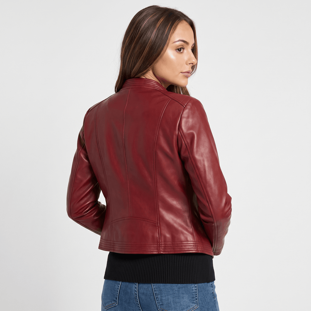 Back view of a women's burgundy leather moto jacket with a tailored fit, smooth finish, and long sleeves.