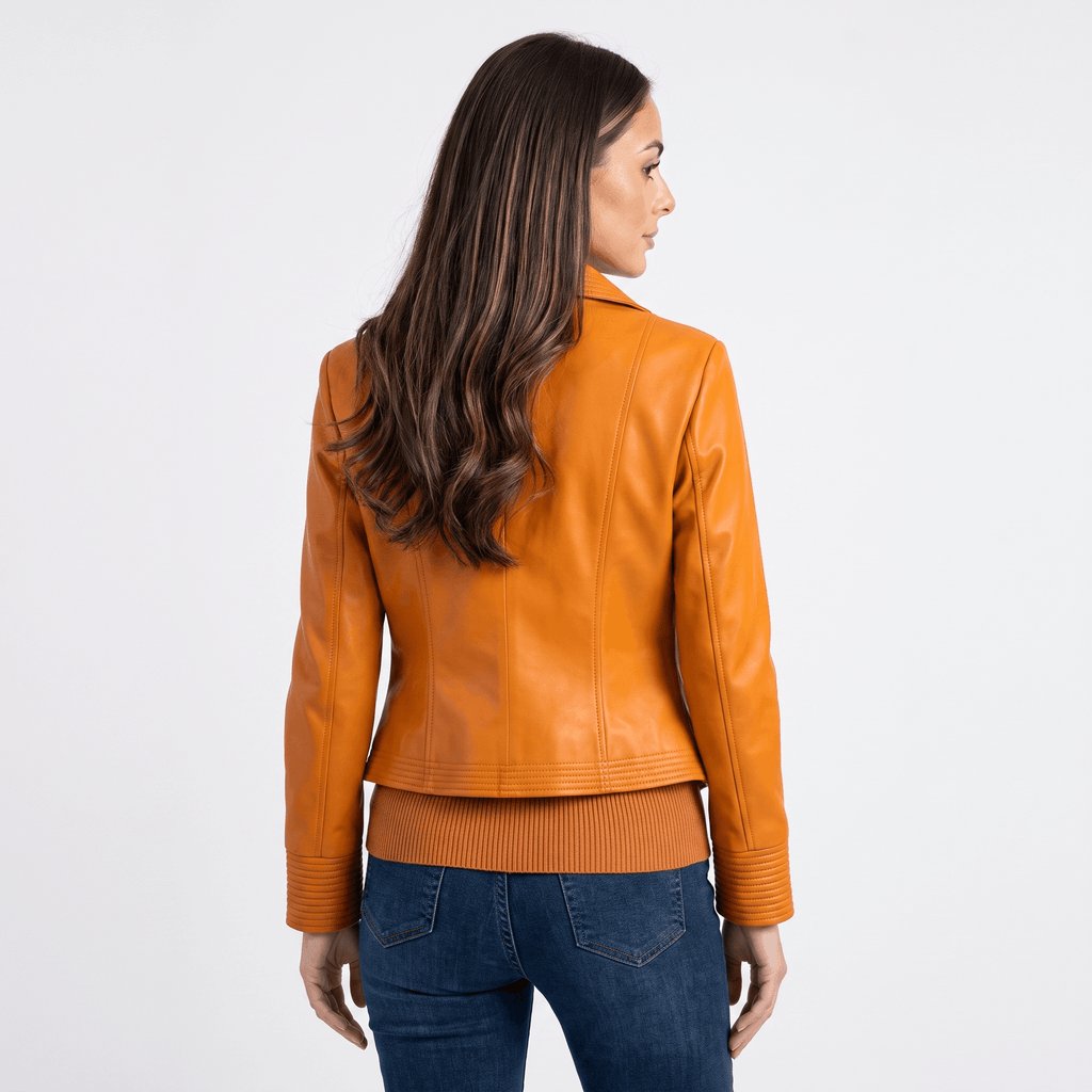 Back view of a women's orange leather moto jacket with a fitted silhouette, smooth faux leather finish, and classic moto styling.
