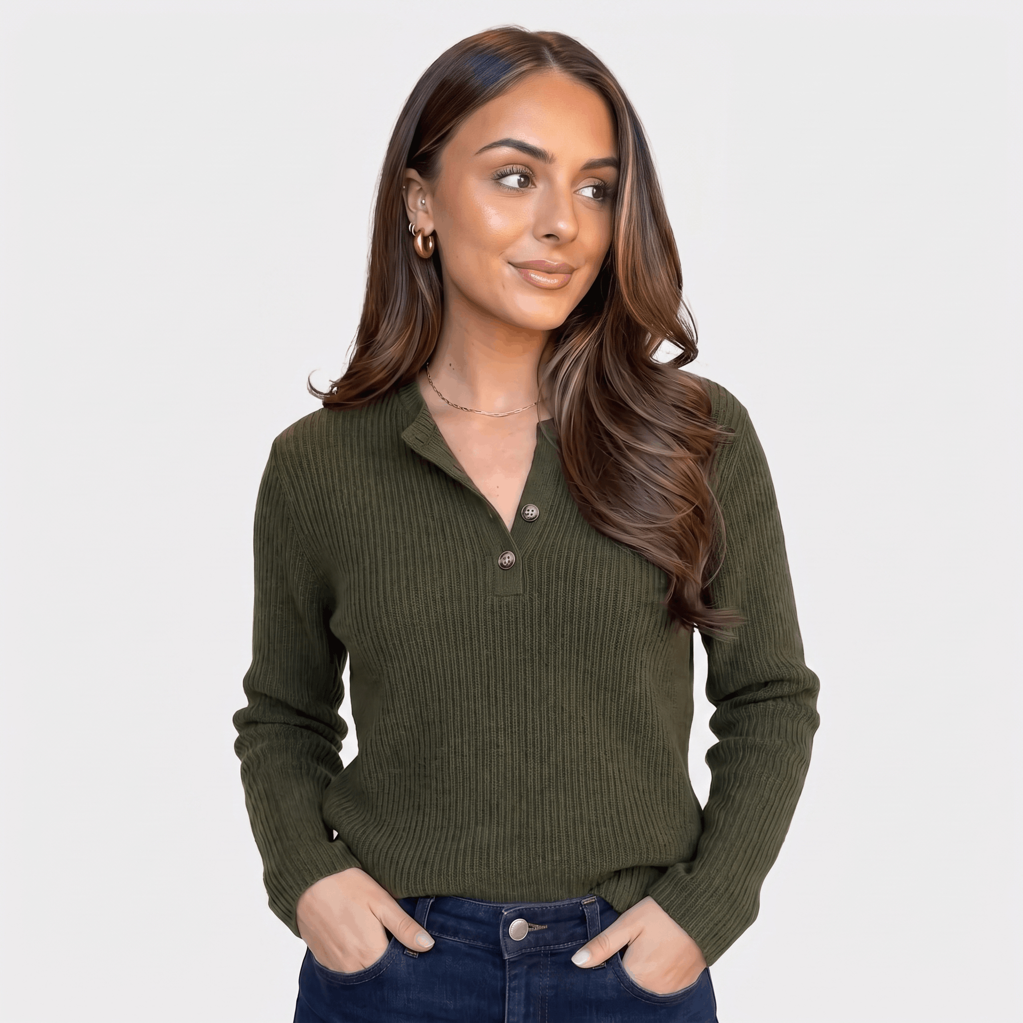 Woman wearing an olive green ribbed henley sweater with a button neckline, long sleeves, and fitted silhouette.