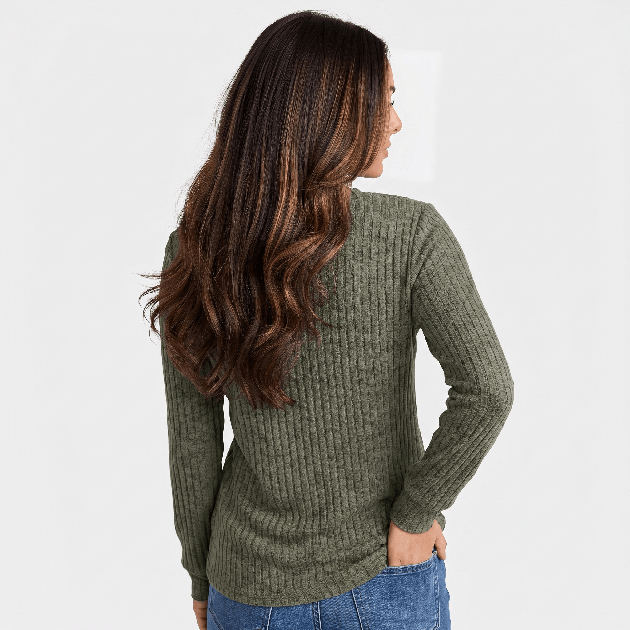 Back view of a woman wearing an olive green textured henley sweater with a relaxed silhouette and long sleeves.