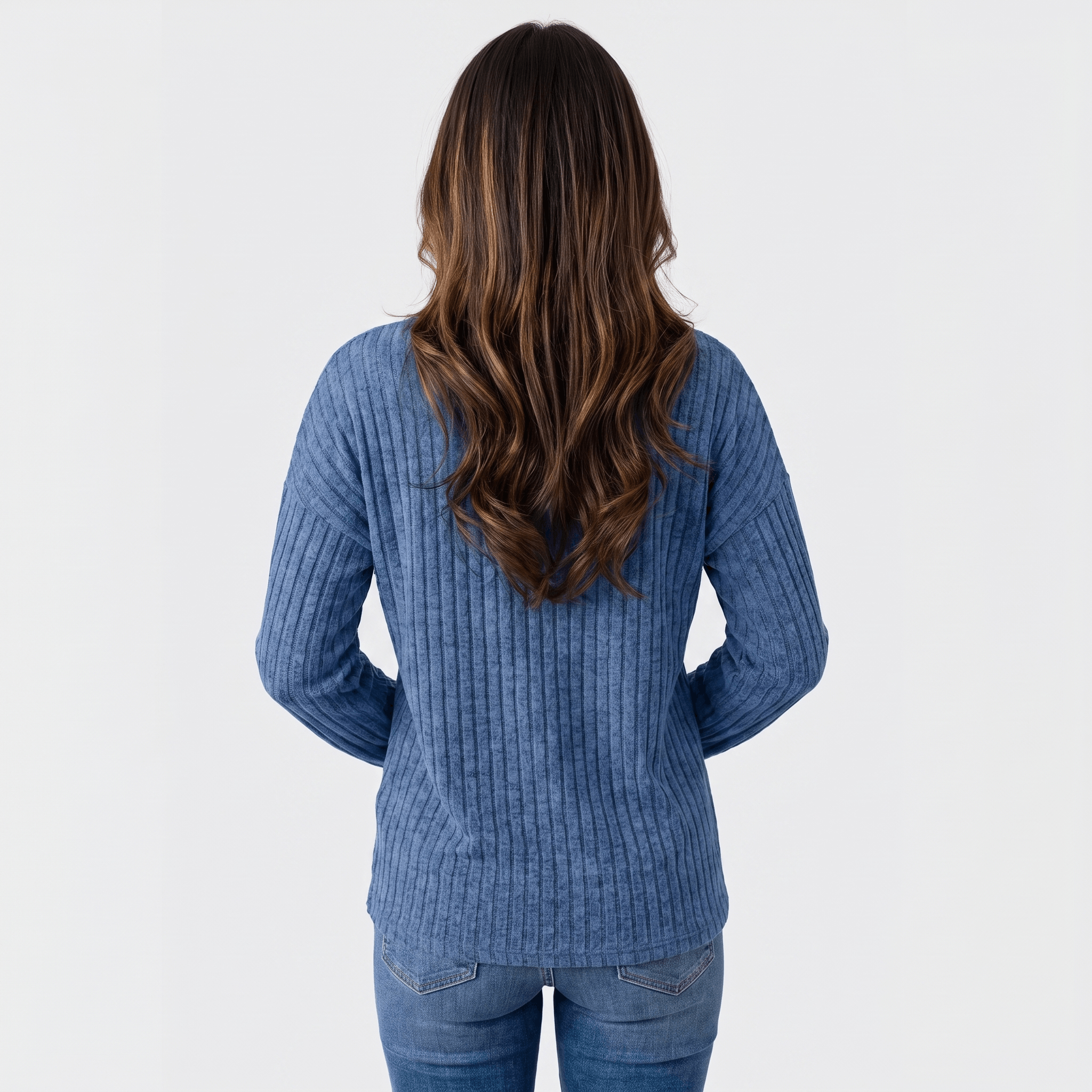 Back view of a woman wearing a blue textured henley sweater with a textured knit finish and relaxed silhouette.