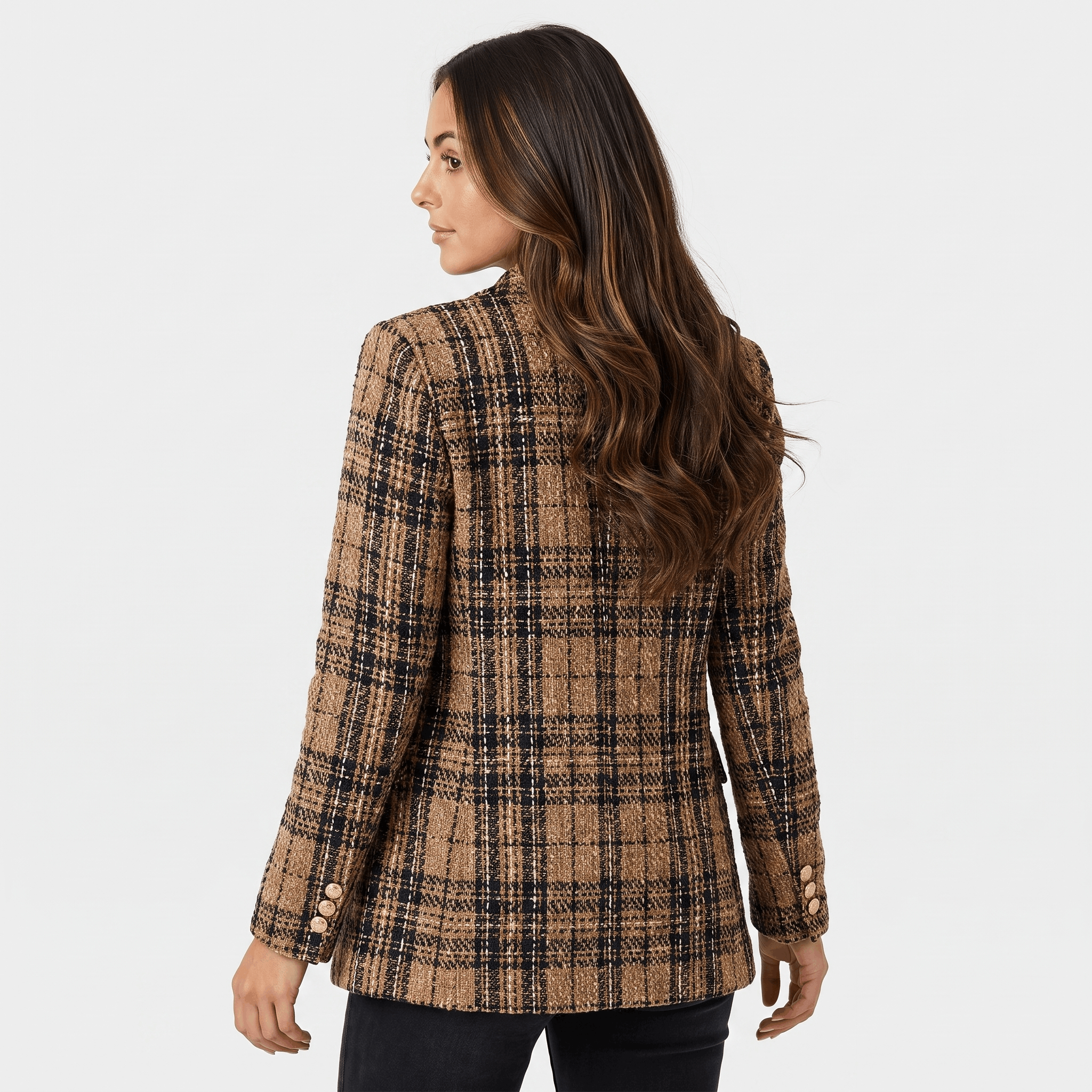 Back view of a woman wearing a brown plaid tweed blazer with a tailored fit and long sleeves.