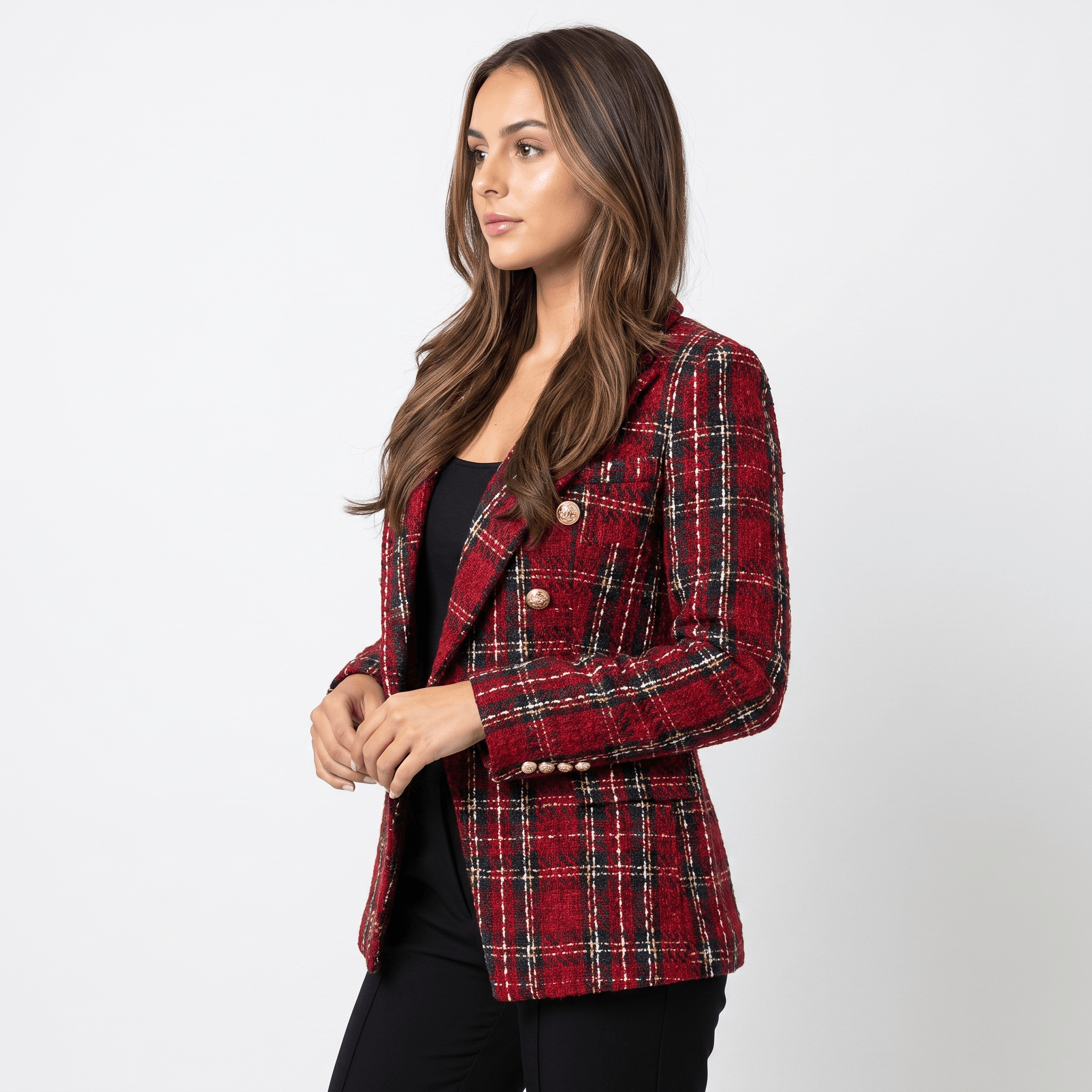 Back view of a woman wearing a red plaid tweed blazer with a tailored fit and long sleeves.