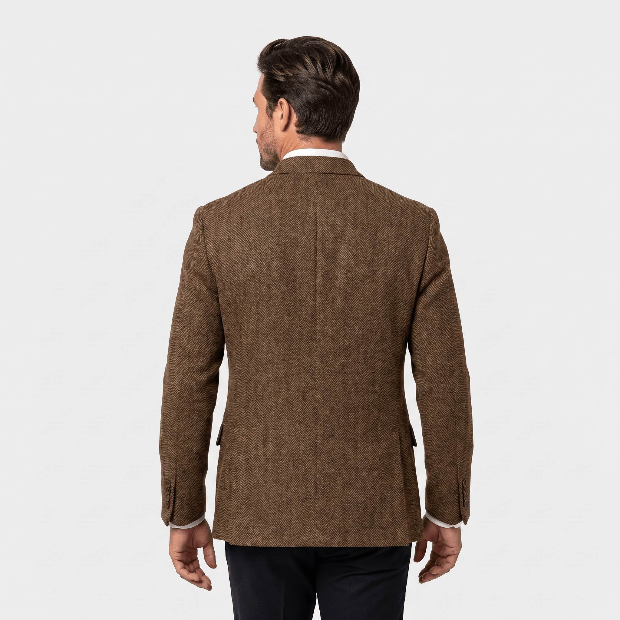 Back view of a man wearing a brown textured blazer with a tailored fit and classic structured design.