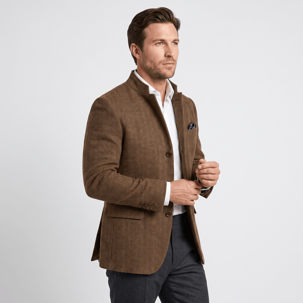 Side view of a man wearing a brown textured blazer with a notched lapel, button closure, flap pockets, and tailored silhouette.