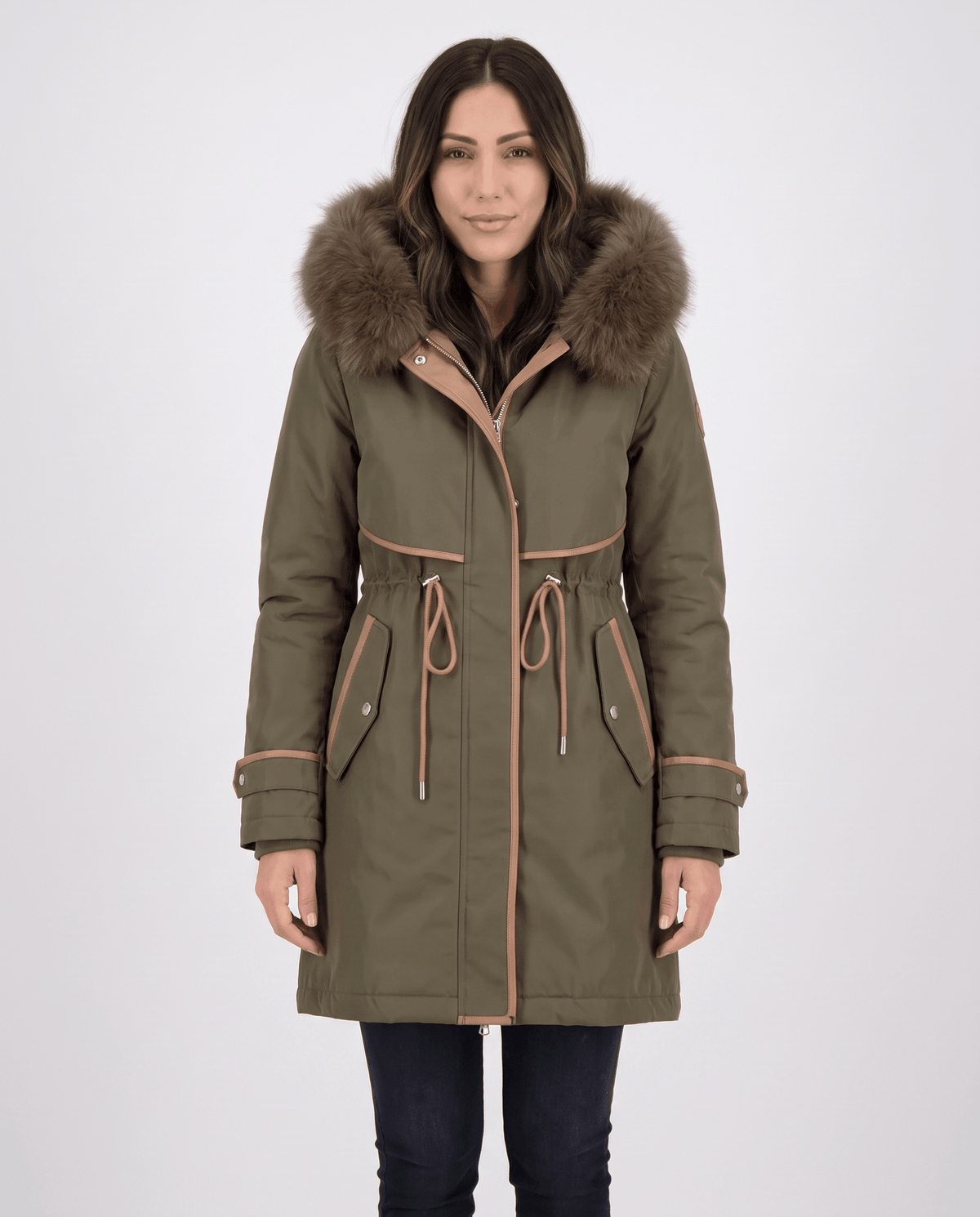 Olive green plush hood trim winter parka with belted waist and front pockets worn by a female model