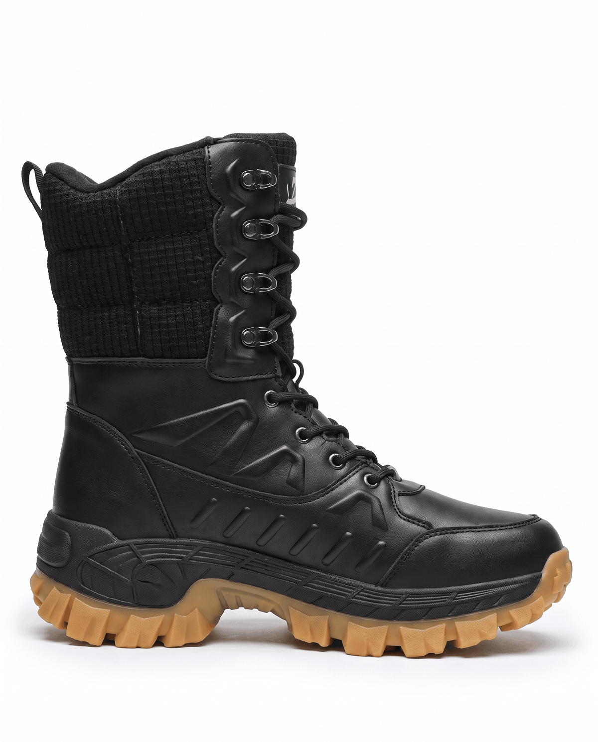 Side profile of a black high-top boot with quilted shaft and tan lug sole