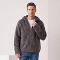 Men's hooded fuzzy zip-up cardigan sweater in gray over a white tee and jeans