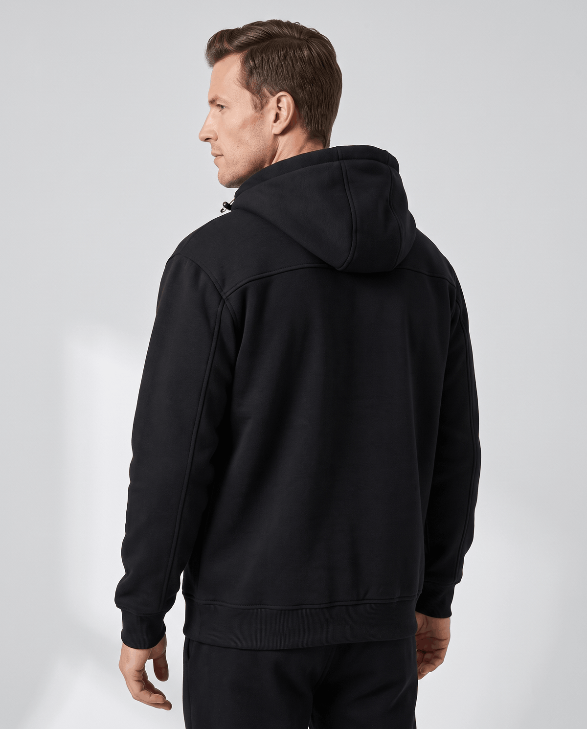 Back view of the black knit fleece hoodie