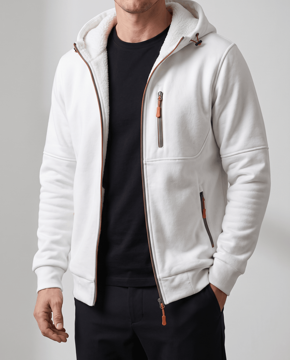 Front view of the white hoodie worn open over a black tee