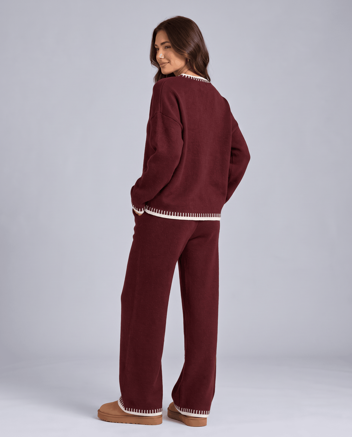 Back view of the burgundy knit sweater and wide-leg pants