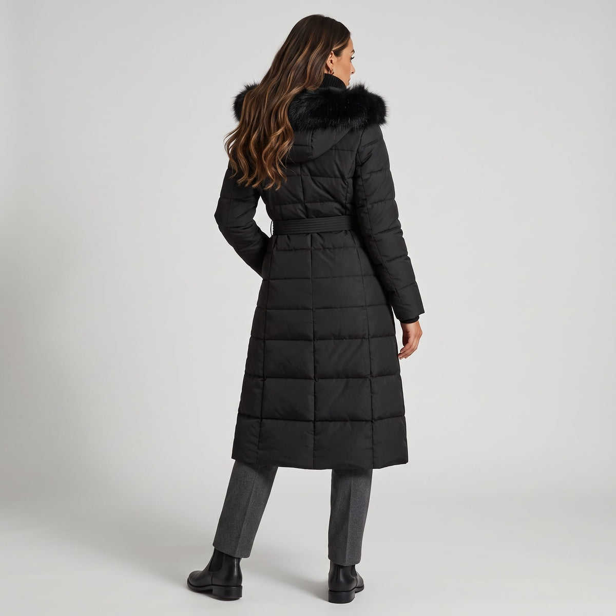 Back view of black coat with plush-trimmed hood down