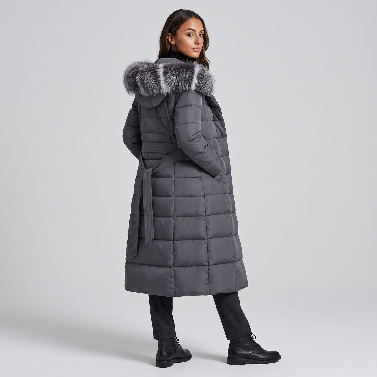 Back view of gray coat showing the hood and horizontal quilting