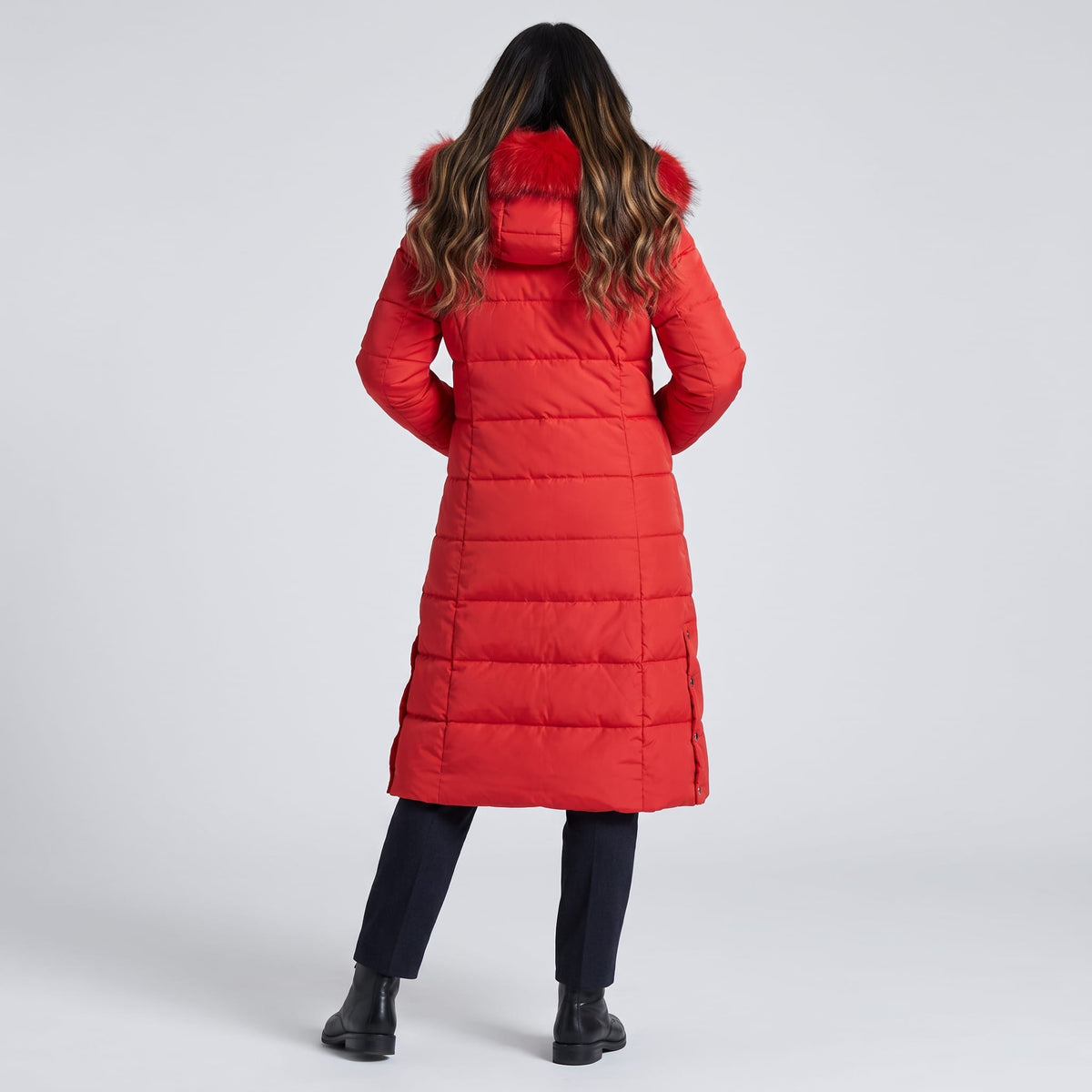 Back view of red coat with hood and horizontal quilting