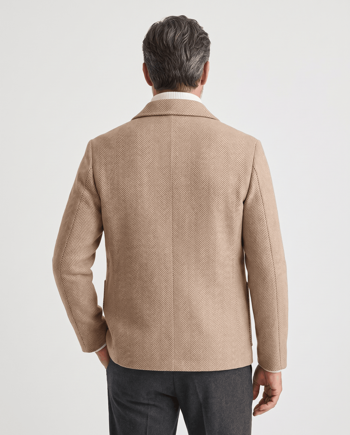 Back view of the Henrik beige herringbone wool coat