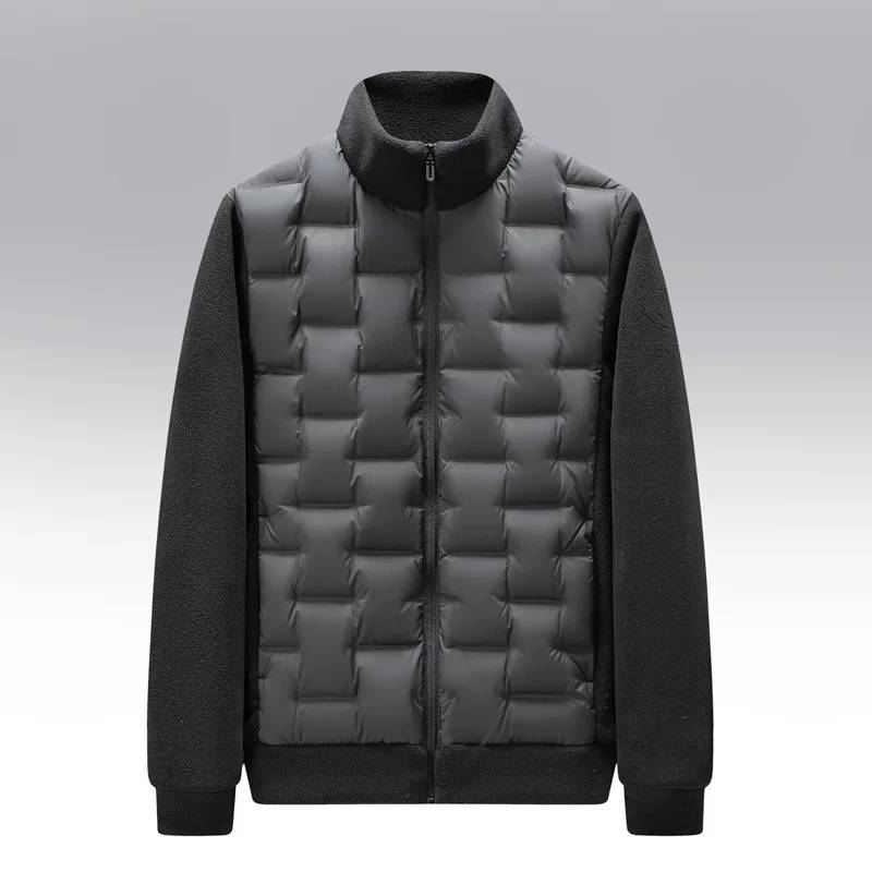 Black hybrid puffer jacket with quilted body and fleece sleeves laid flat, front view
