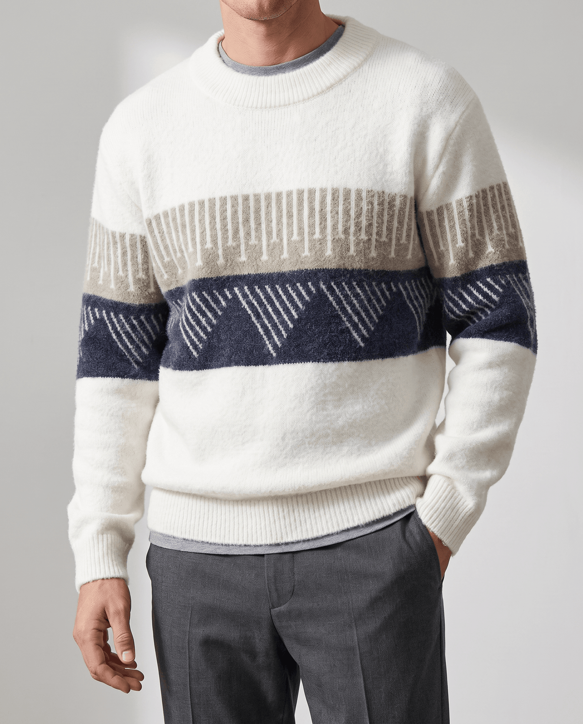 Front close-up of white crew neck sweater with gray trousers