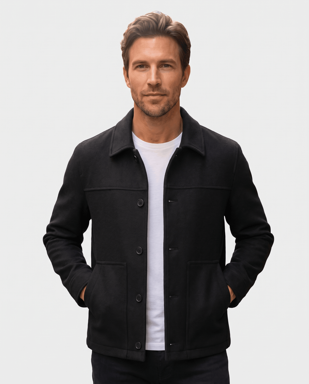 Black jacket worn buttoned over a white tee, hands at the sides