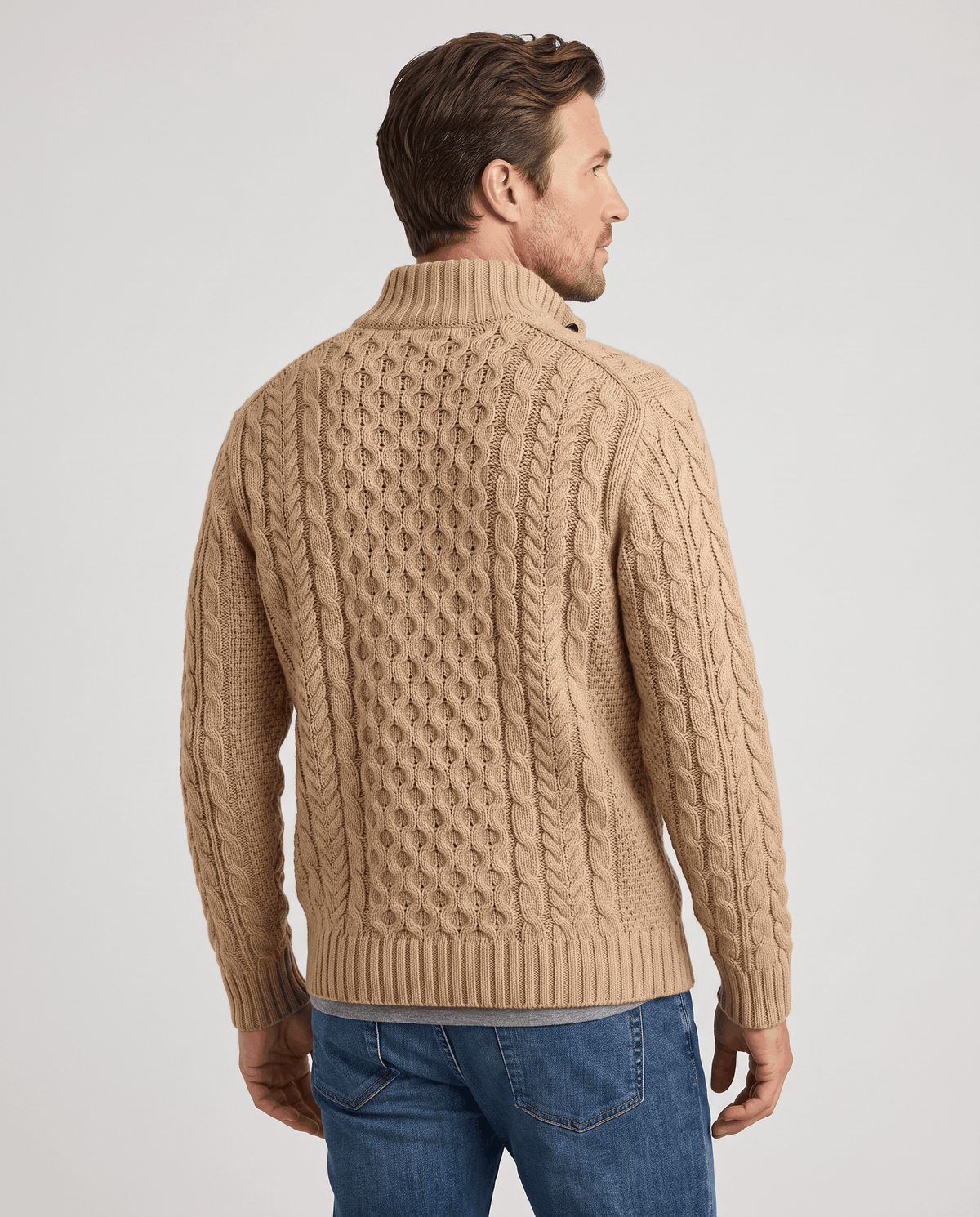 Back view of khaki cable sweater with ribbed stand collar and hem