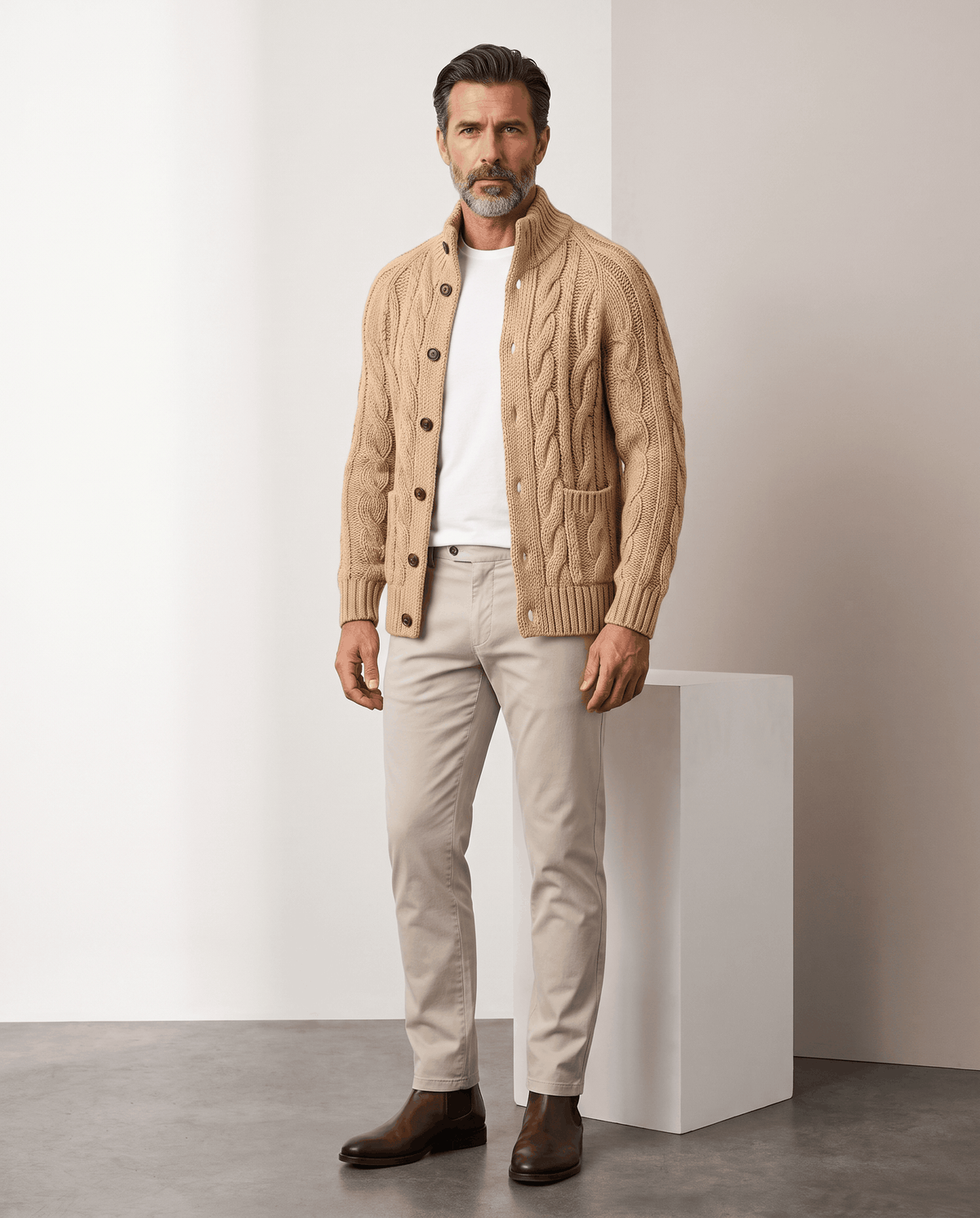 Full-length look with light brown cardigan, beige trousers and brown shoes