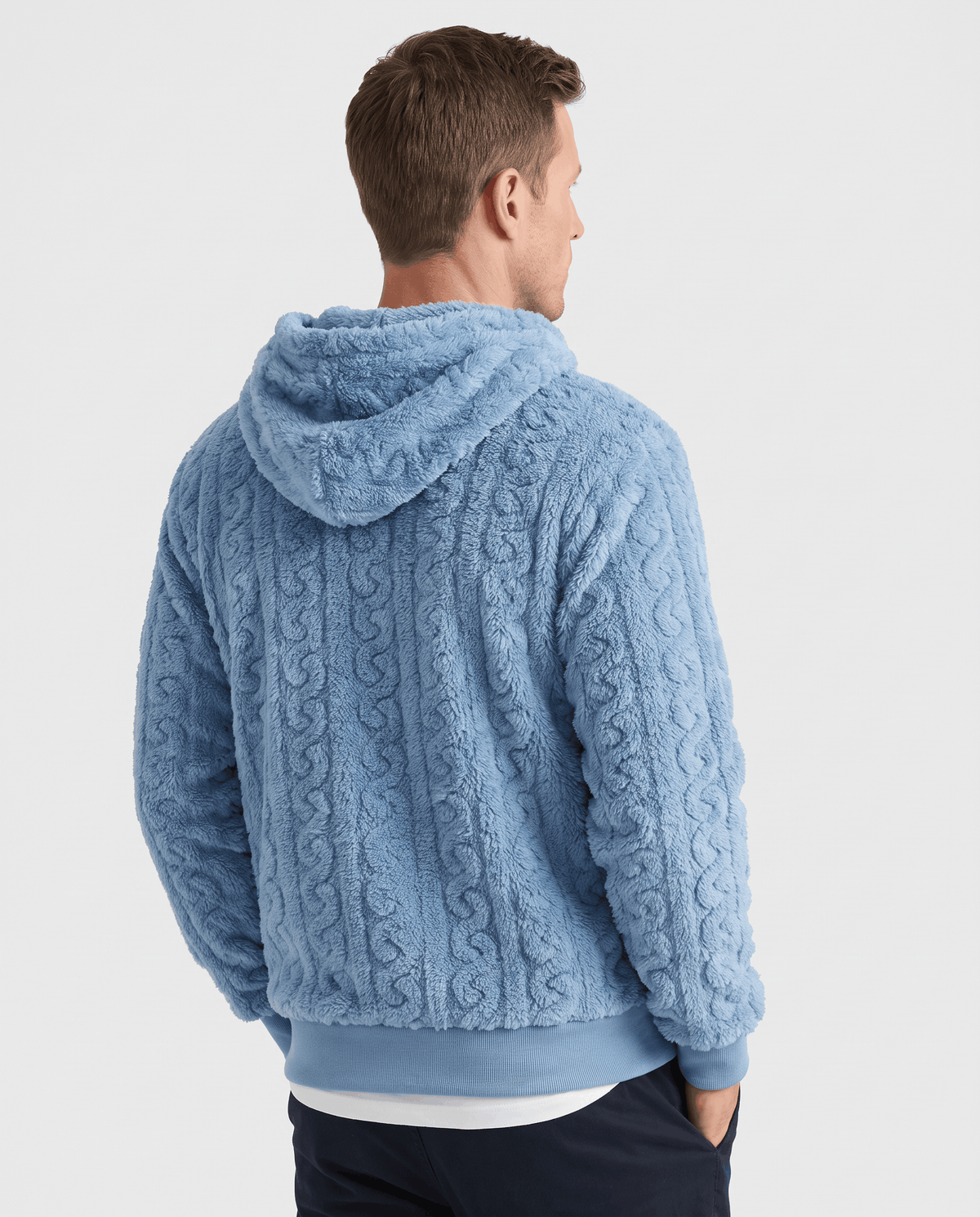 Back of light blue hoodie showing the hood and raised cable pattern