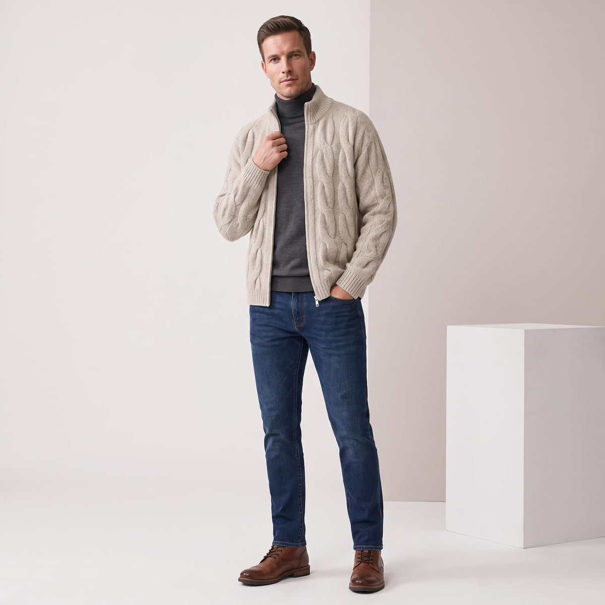 Full-length view of the khaki cardigan with blue jeans and brown shoes