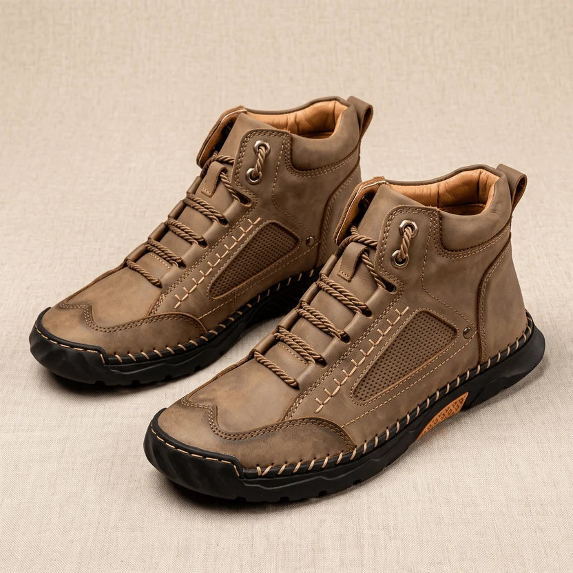 Pair of camel vegan leather wide toe box hiking boots with lace-up front and lug sole