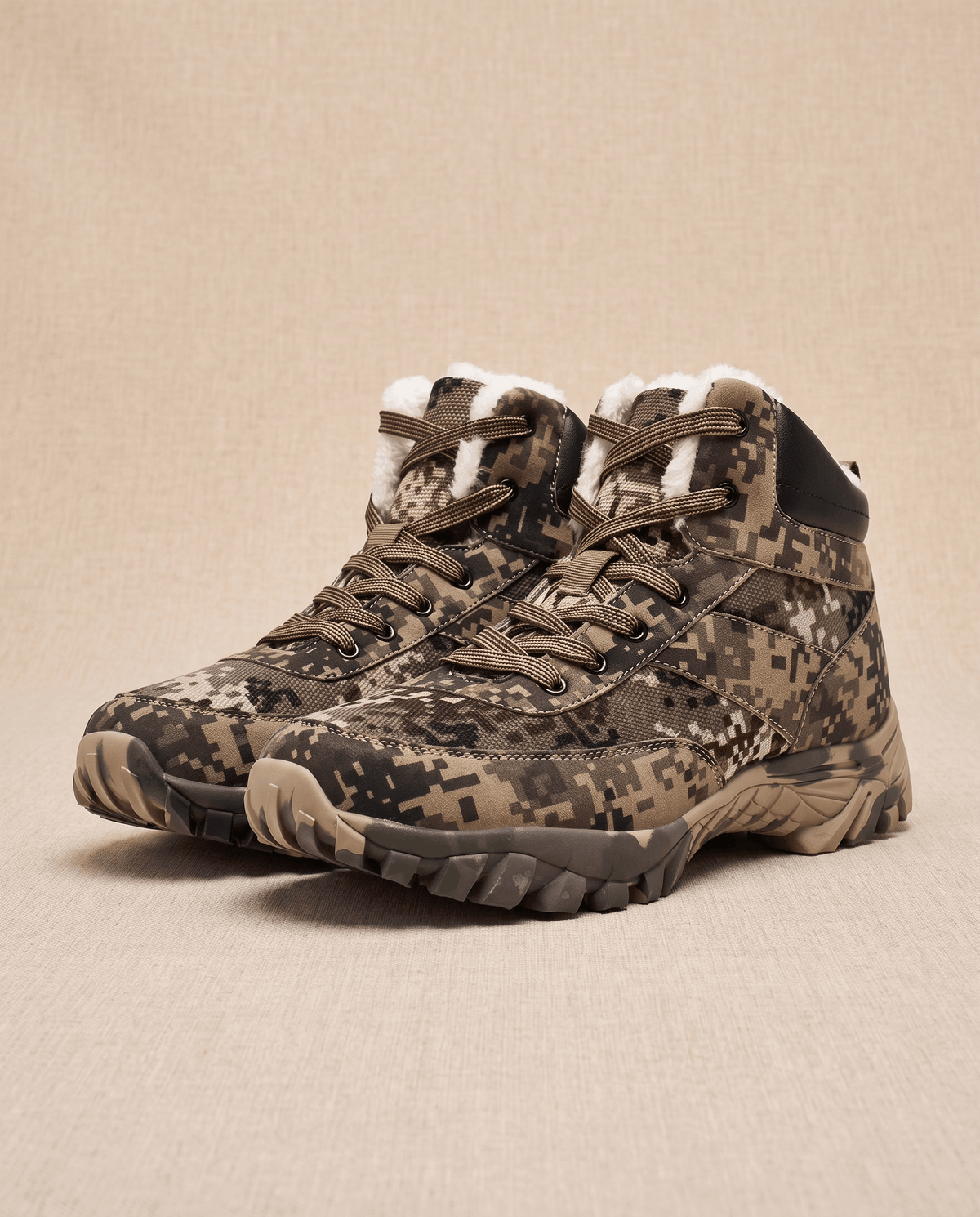 Single brown camo boot in profile showing padded tongue and top lace hooks