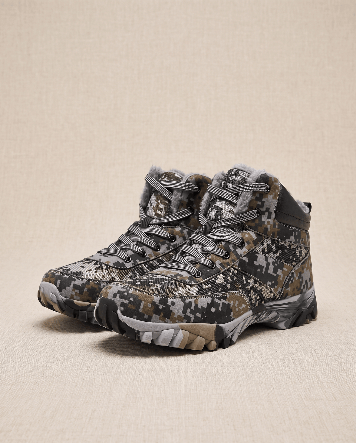 Green camo pair straight on against a soft neutral studio background
