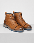 Brown smooth grain leather cap toe boots featuring lace-up fronts, side zip entries, and rugged blue lug outsoles.
