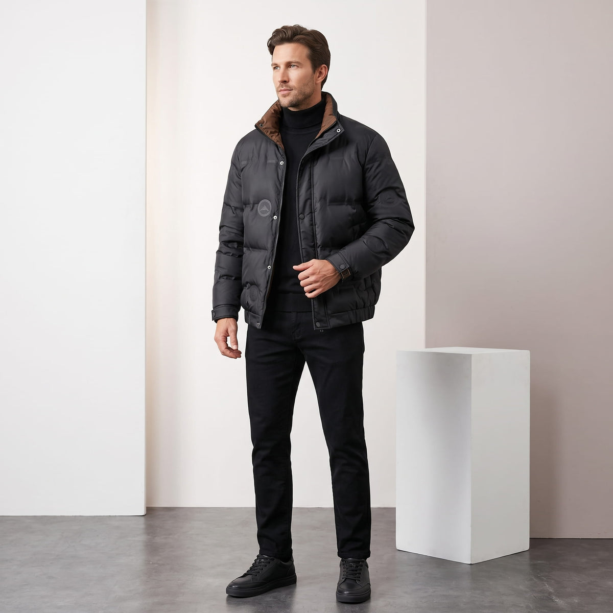 Black jacket styled full-length with dark jeans and black boots