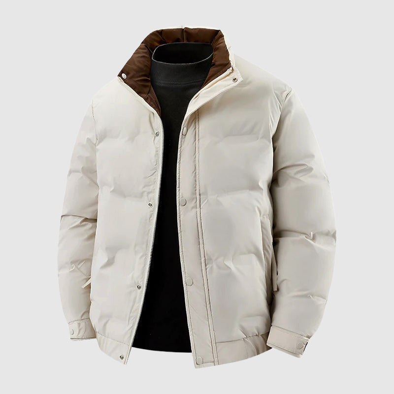 Flat product shot of the cream jacket showing the tan corduroy collar