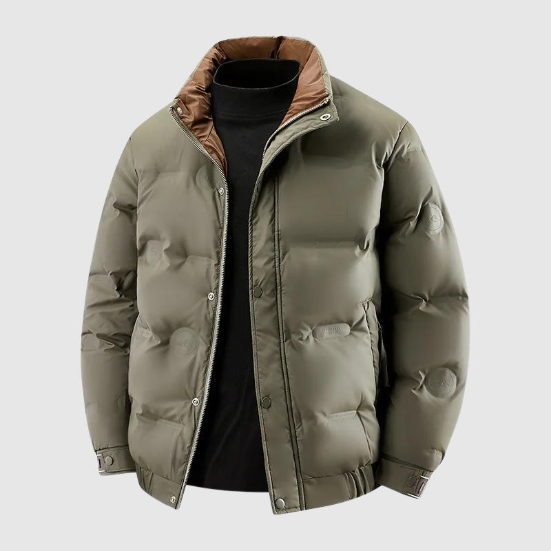 Flat product shot of the olive jacket showing the tan corduroy collar