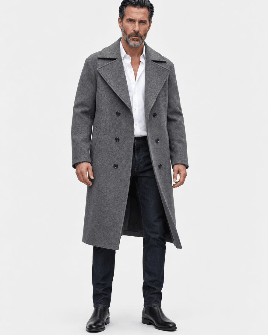 Dark gray overcoat worn open with dark trousers and black shoes, full-length studio view