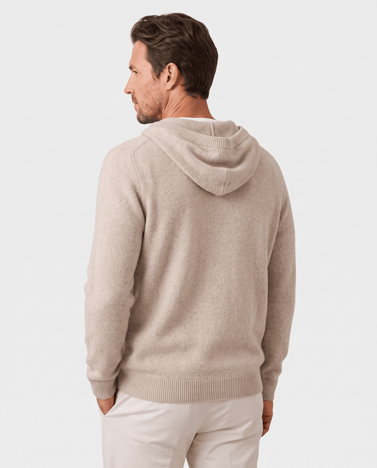 Back view of a beige fine knit hoodie with a relaxed fit and hood