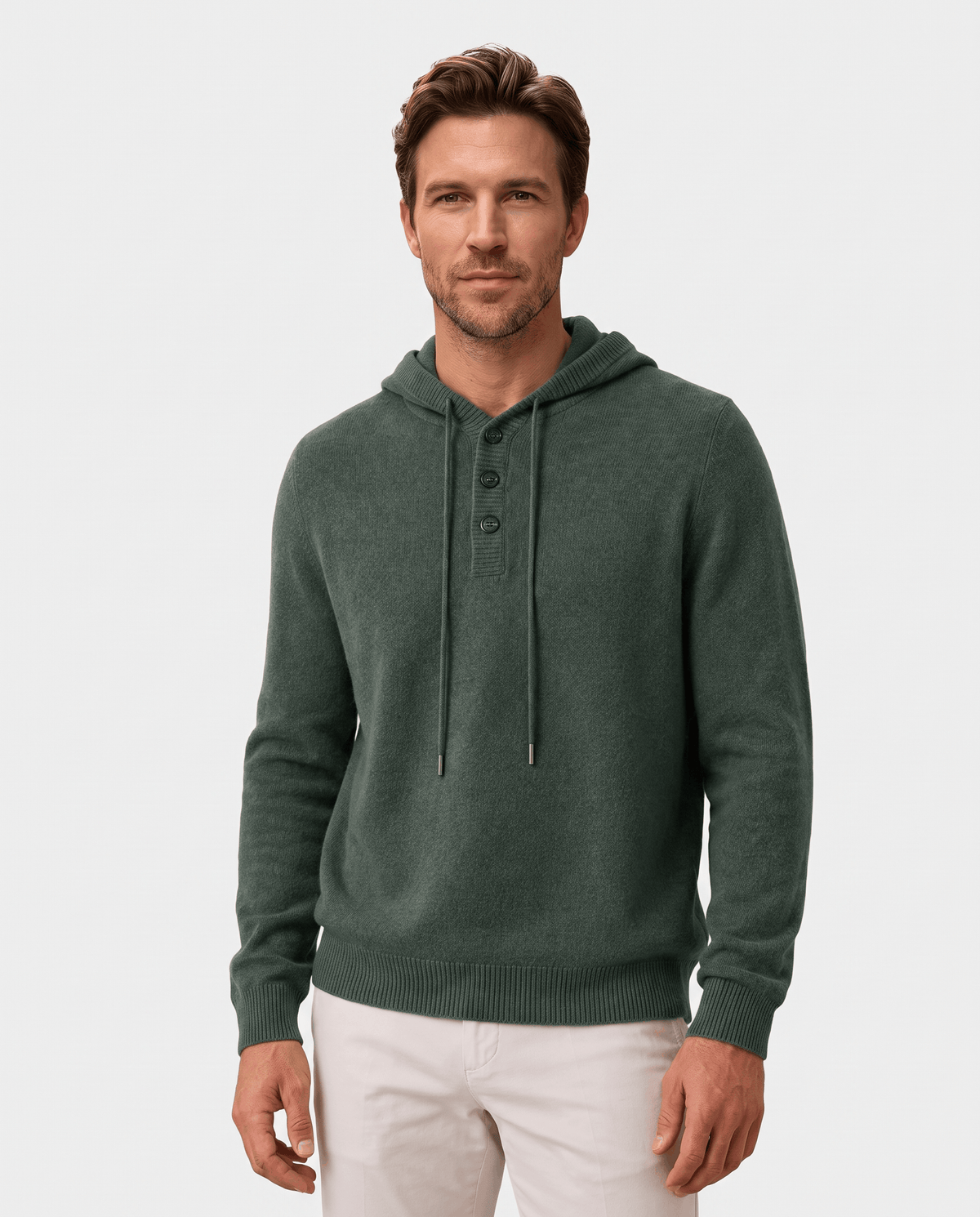 Man wearing a green fine wool pullover hoodie with a three-button placket, front view