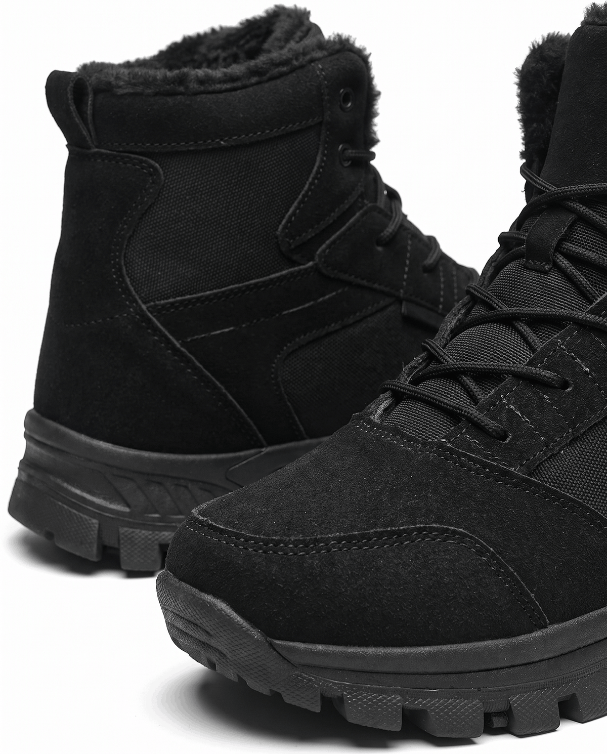 Close crop of the soft pile lining around the collar of a black boot